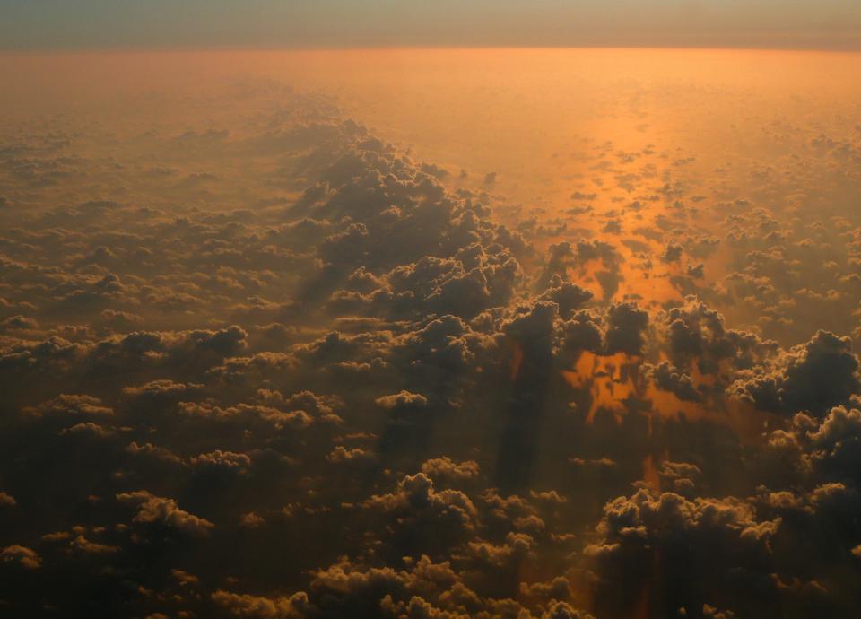 Sunset Above The Clouds
