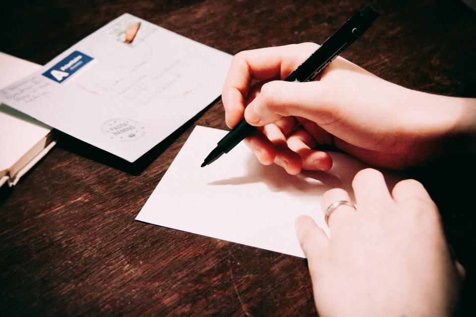 Writing Postcard