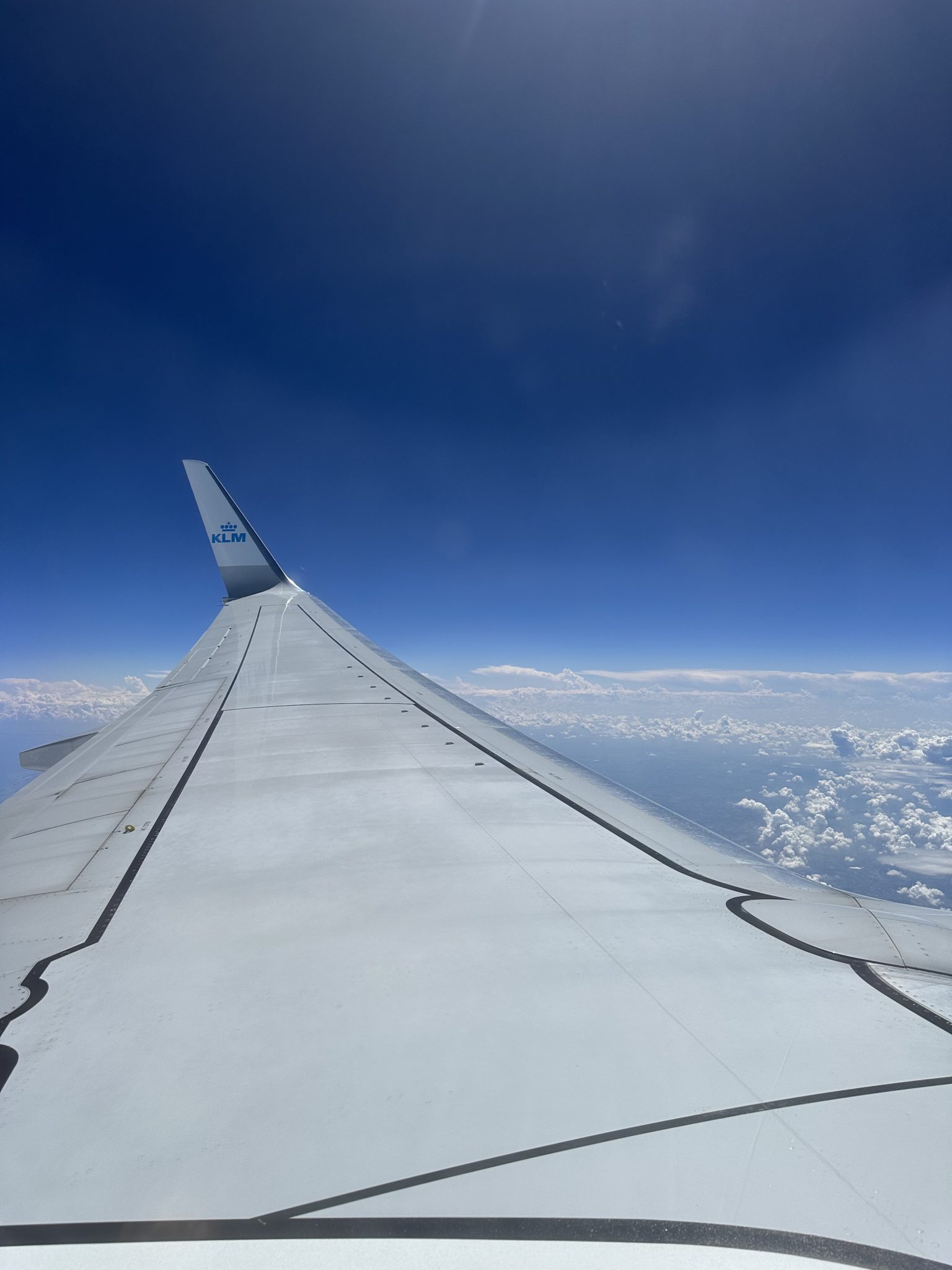 Wing of an KLM 737-800 flying over Venice, Italy (unfortunately, you can’t see the city)