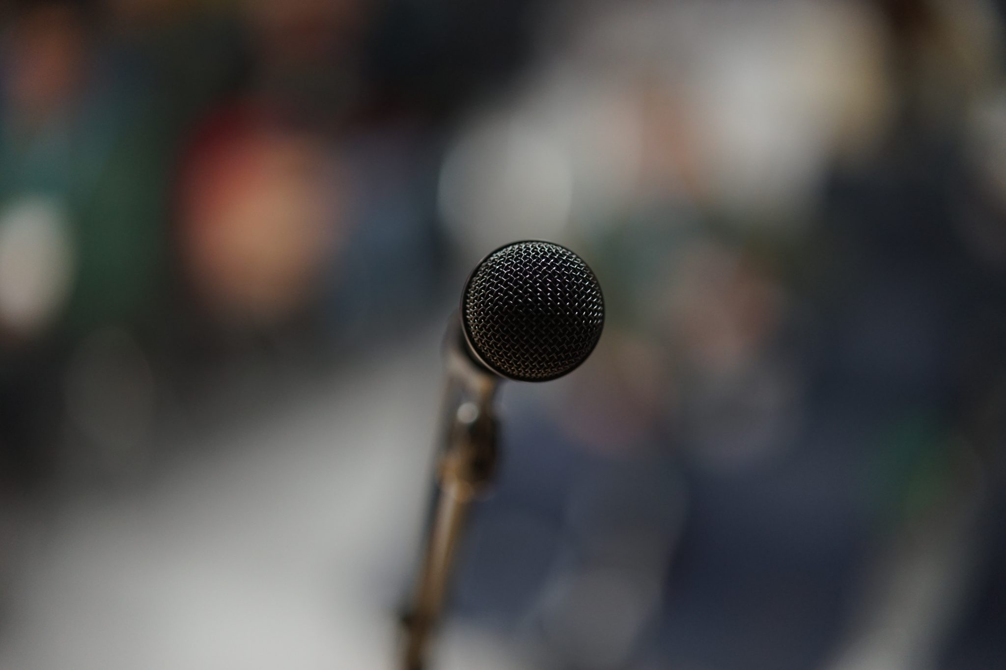 Speaker microphone at a WordCamp tags: microphone, speaker, blur, bokeh, WordCamp