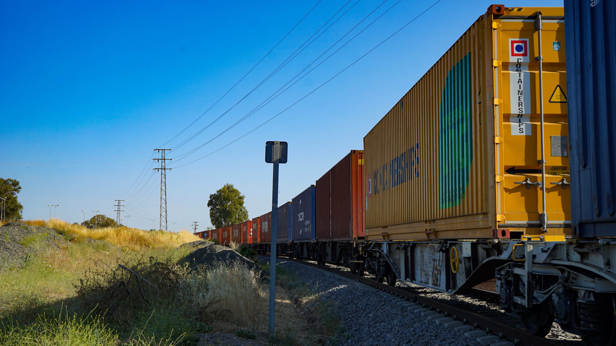 Huge train leaving a freight station