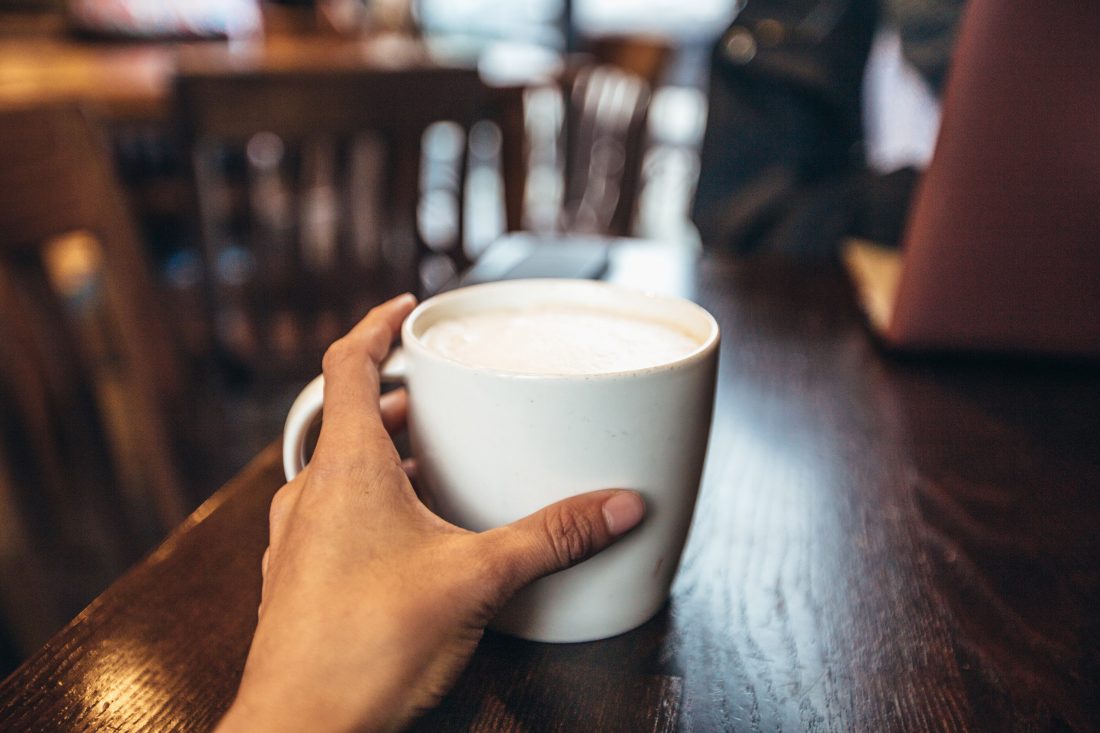 Coffee Cup in Hand