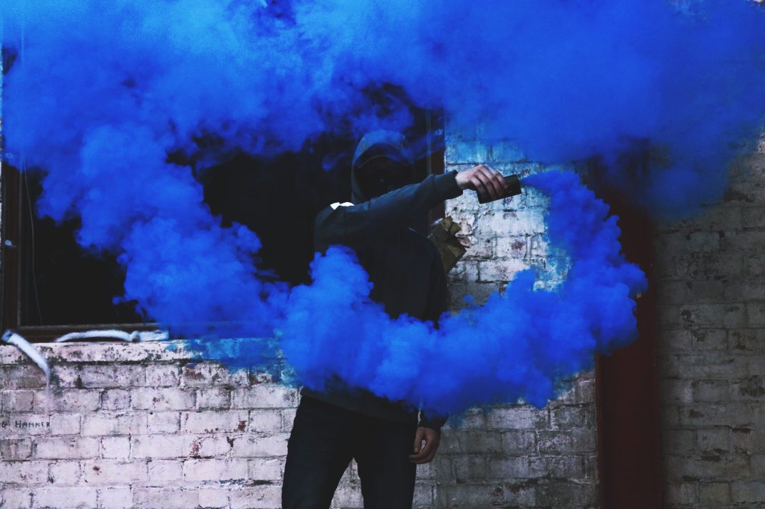 Man with Blue Flare