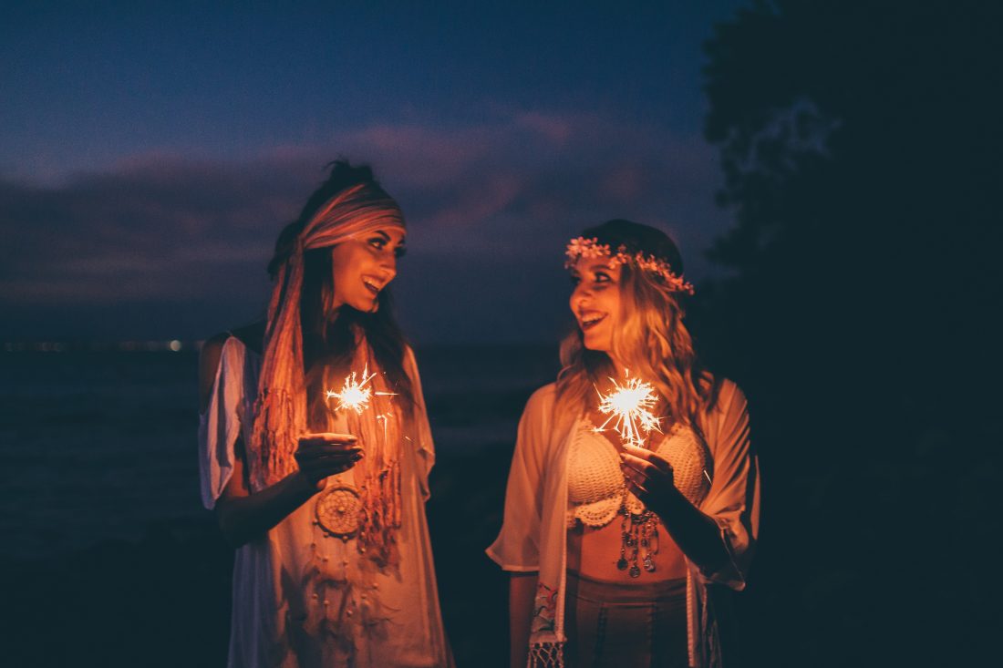 Women Holding Sparklers Evening
