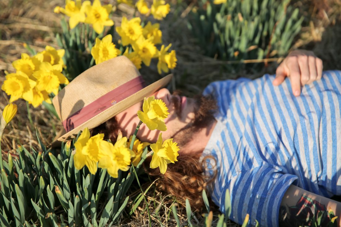 Man Lying in Flowers