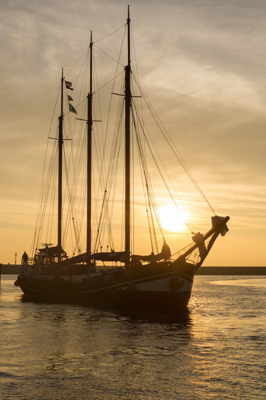 Sail boat at sunset