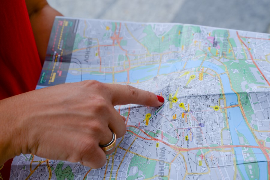 Woman pointing on a map