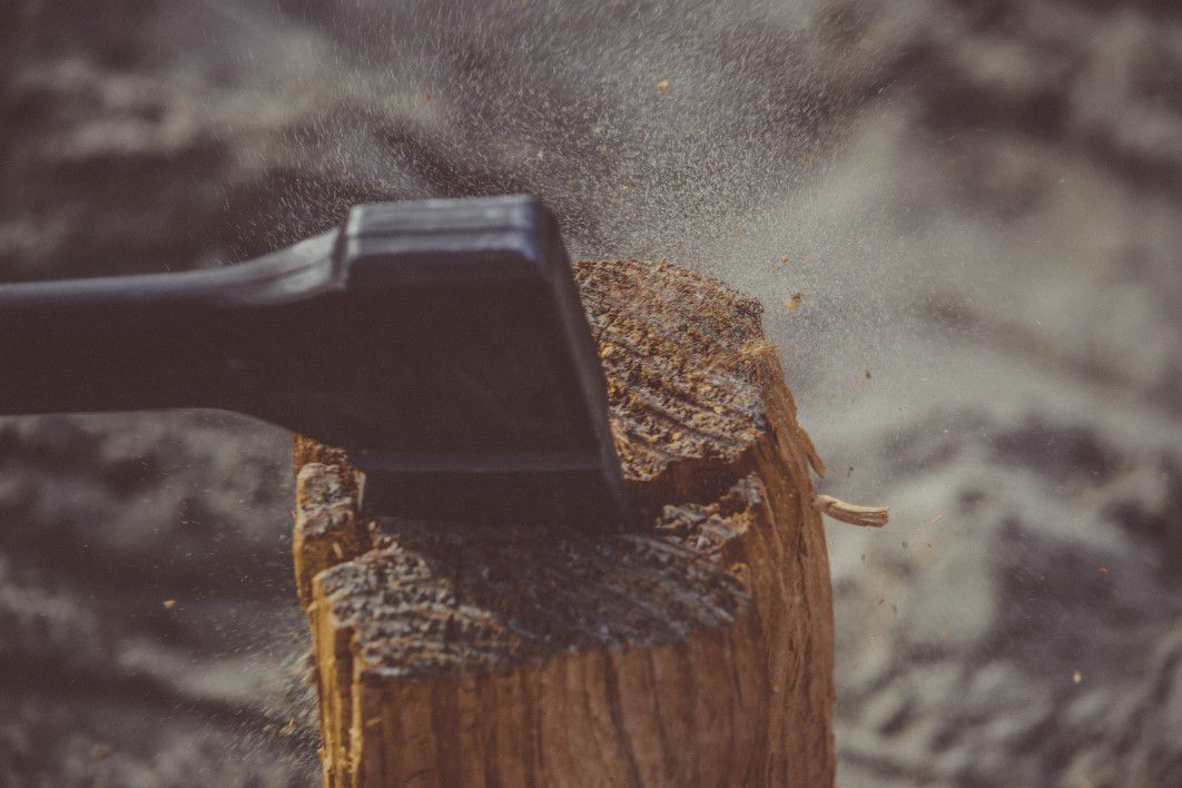 Axe Chopping Log Wood
