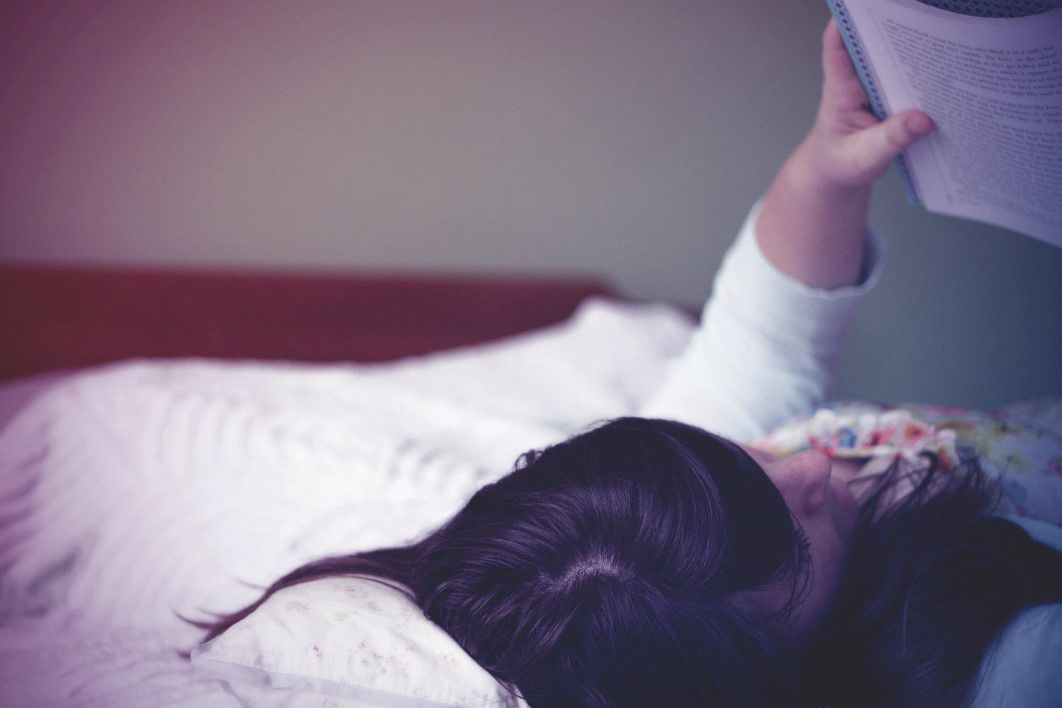 Woman Reading Book Bed