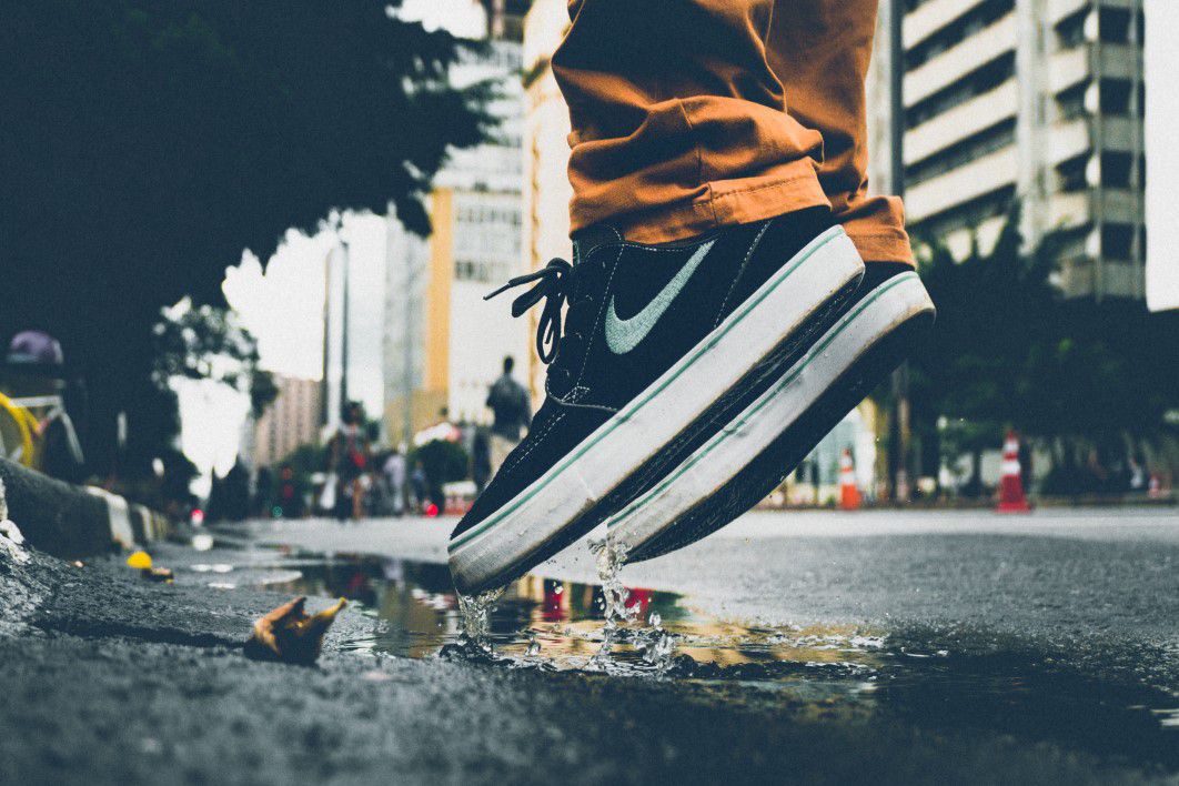 Man Jumping Puddle Nike