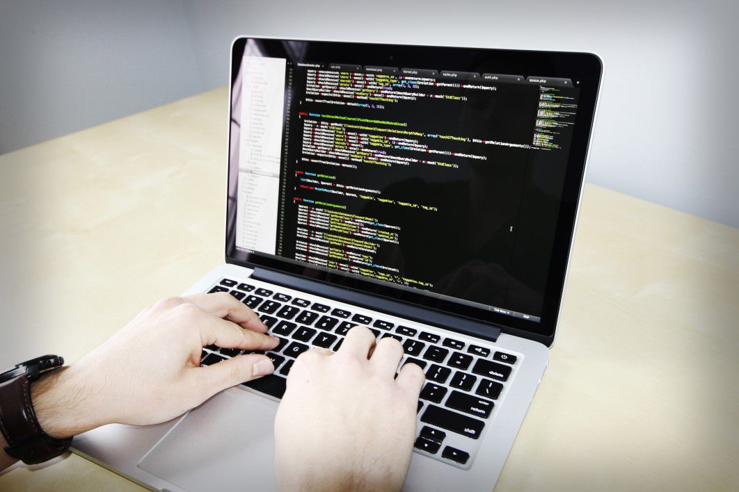 Hands Coding MacBook