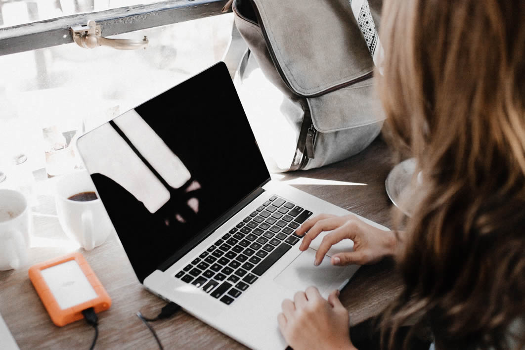 Woman Satchel MacBook Working