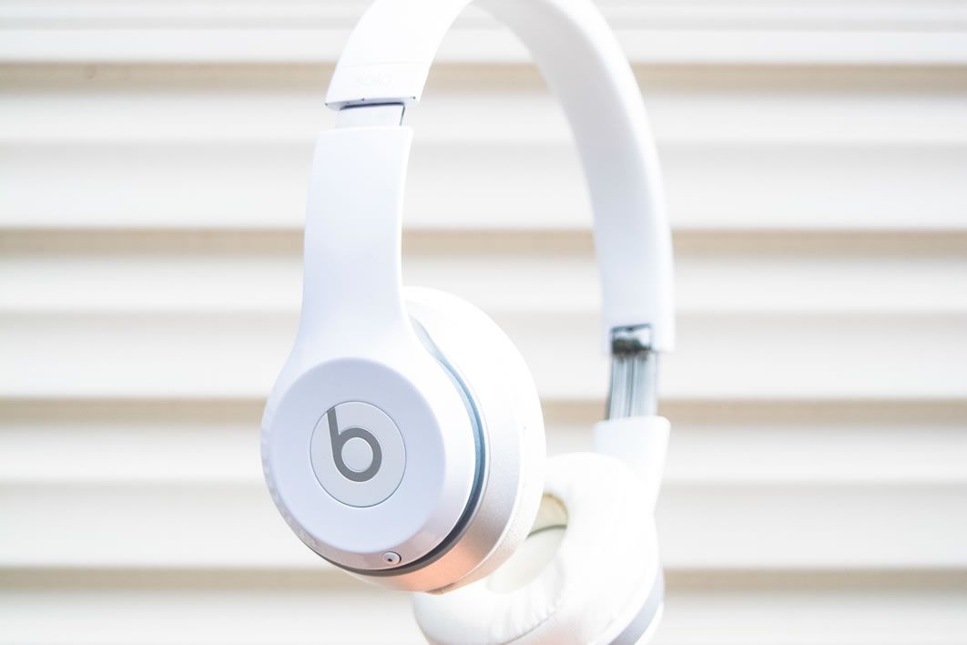 White Beats Headphones Hand