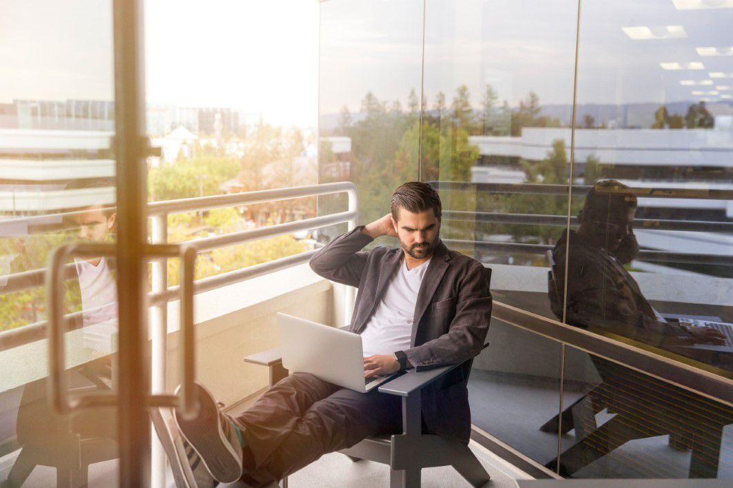 Man Sitting Outside Laptop