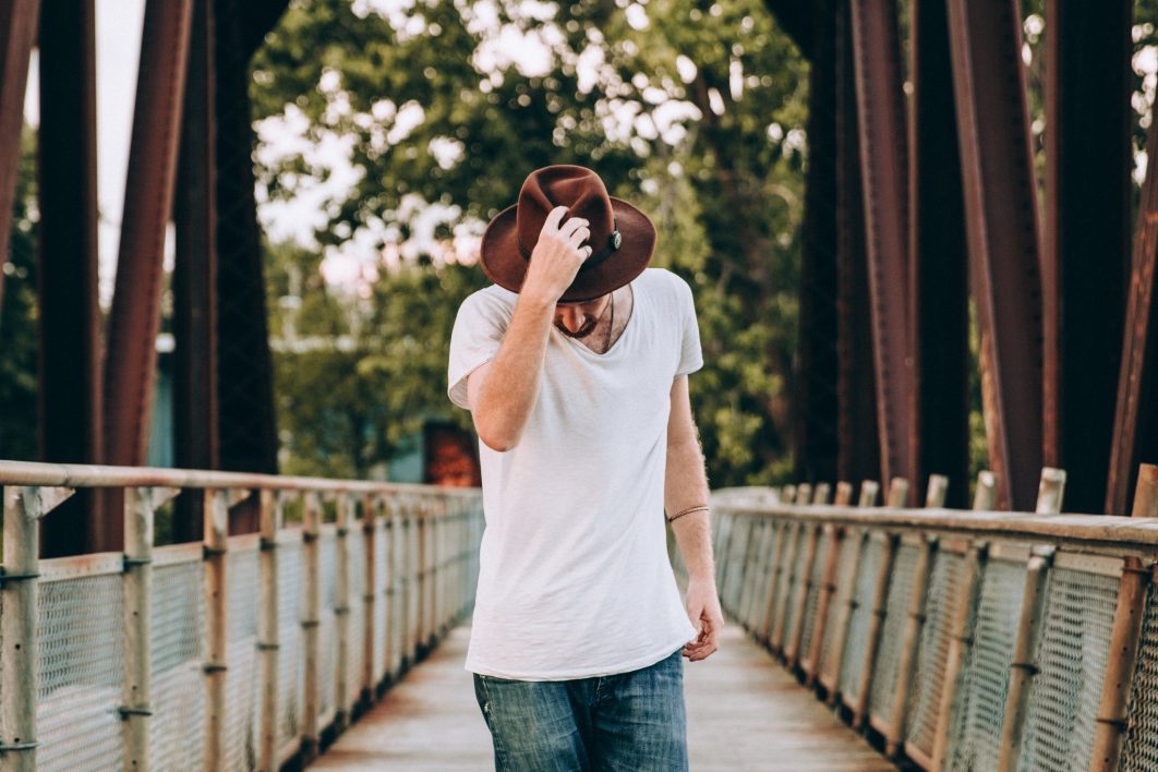 Man Tipping Hat