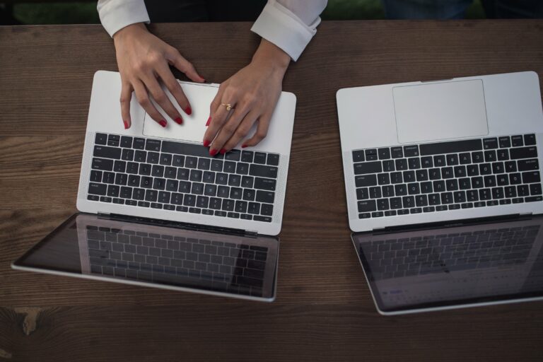 Woman Typing Laptop
