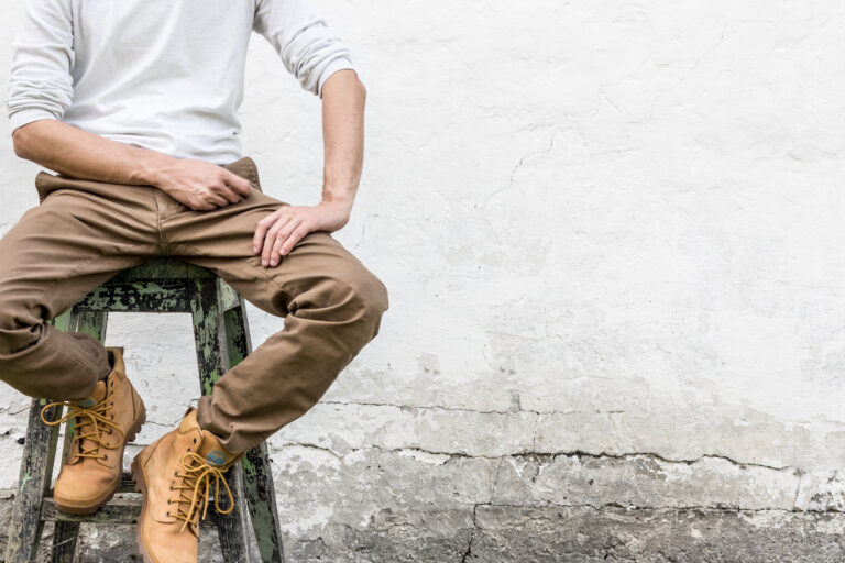 Man Sitting Wall