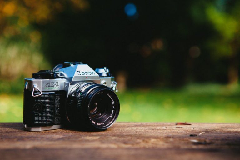 Camera on Wood Shelf