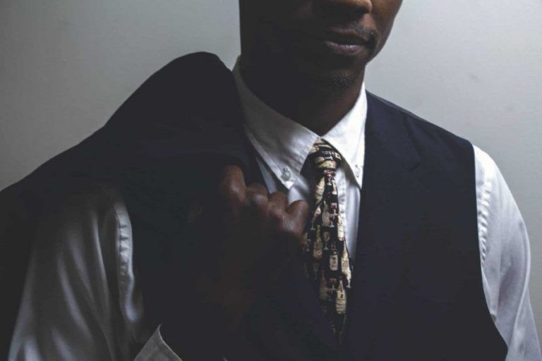 Model Holding Suit Jacket
