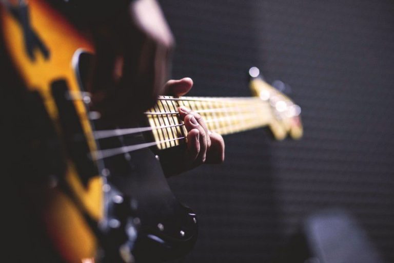 Playing Electric Bass Guitar