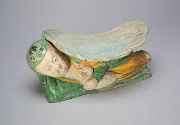Pillow with Boy Supporting a Cloud-Shaped Headdrest