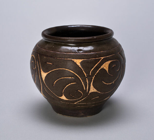 Small Globular Jar with Rolled Lip and Stylized Leaves