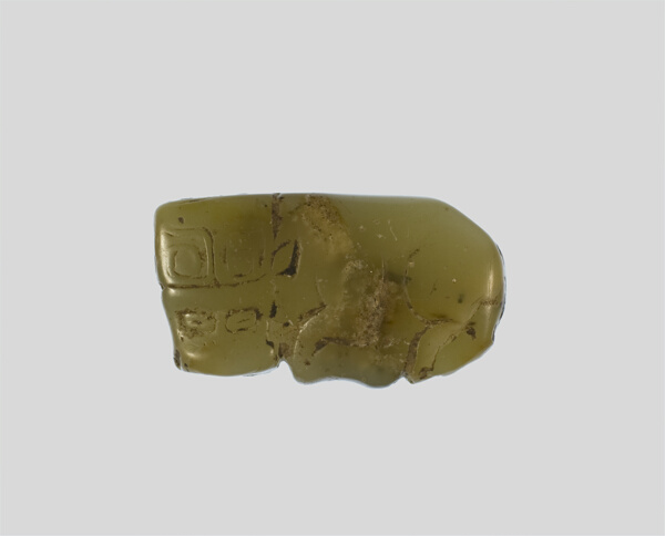 Pendant, crouching buffalo.